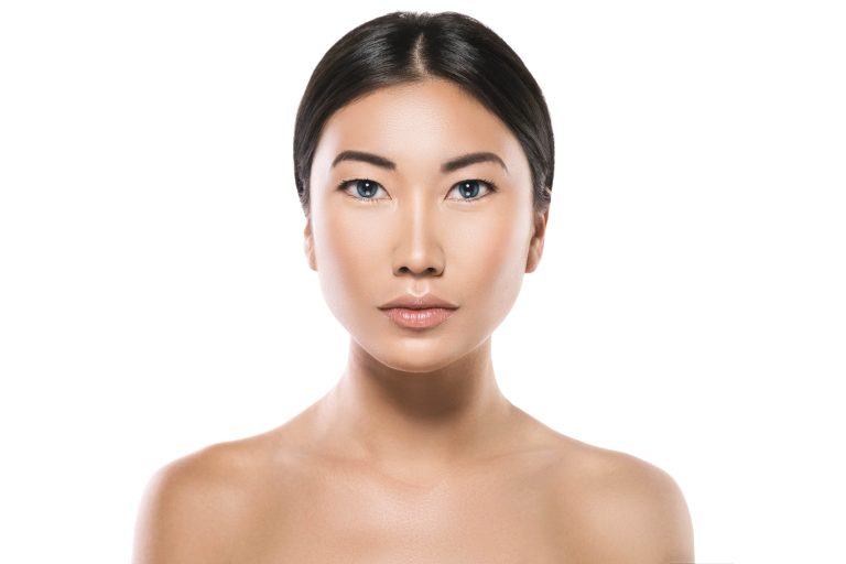 Botox vs Fillers: Which Suits You Best? 2 a woman with blue eyes and bare shoulders